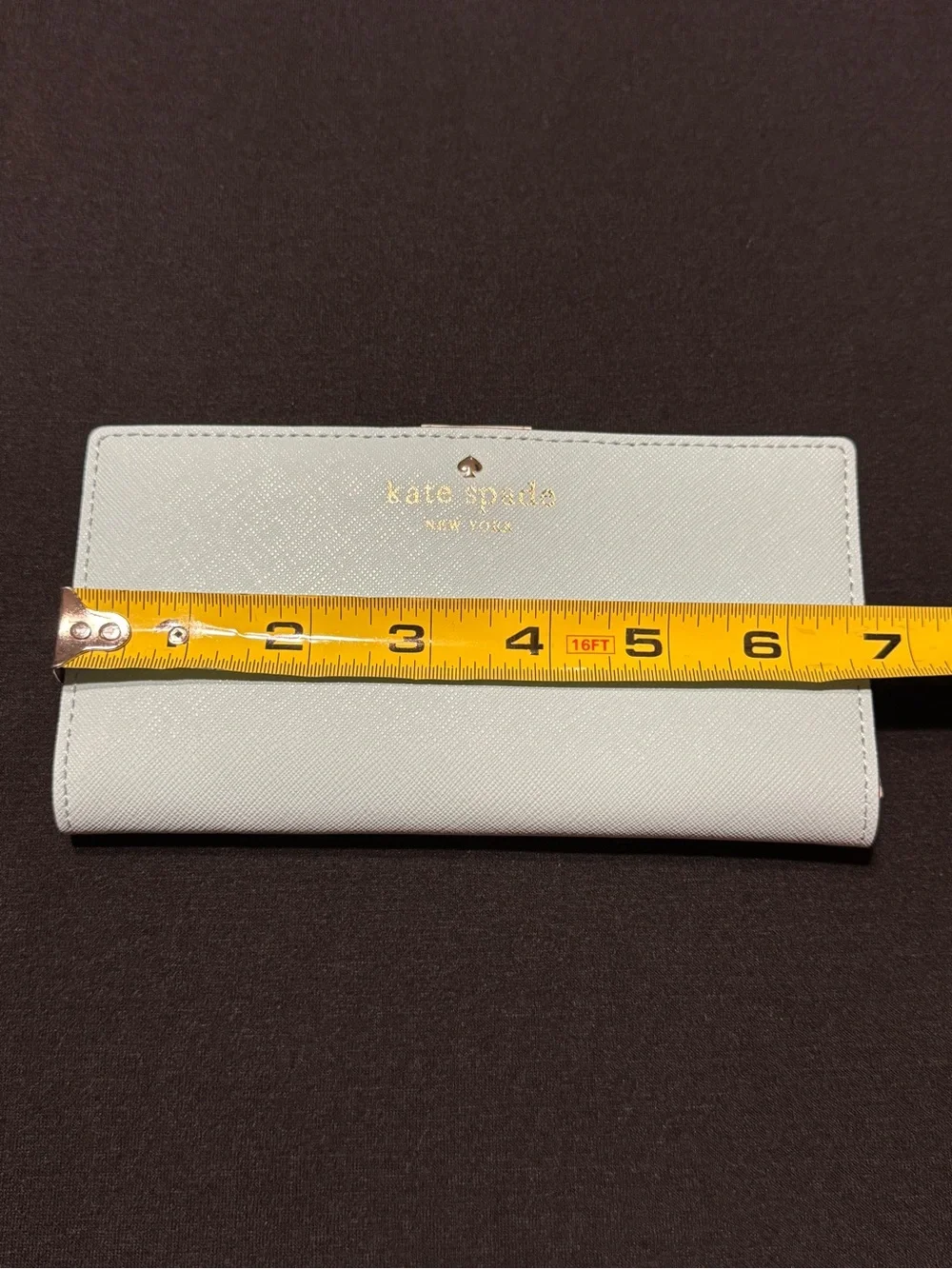 NWOT Kate Spade light blue wallet with gold logo